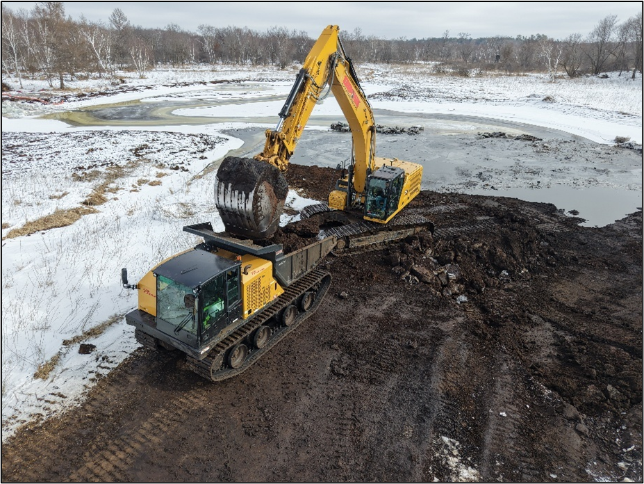 Photo: Shows active construction of a wetland restoration practice. This project will treat water from a county ditch. Smaller projects, such as those using ditch plugs to restore shallow-water wetland hydrology, are also eligible for certain ACD grant funds.